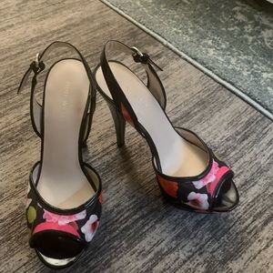 Nine West pumps, multi colored floral on black satin, excellent condition.